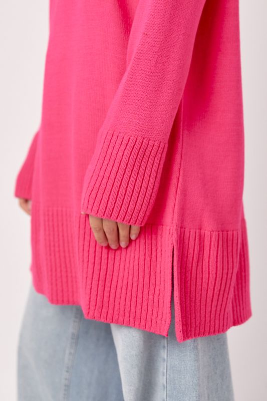 Жіноча в'язана туніка oversize із розрізами з боків