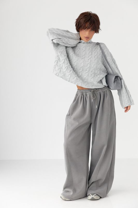 Вільний в'язаний светр з косичками