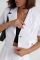 Костюм зі спідницею плісе і коротким жакетом